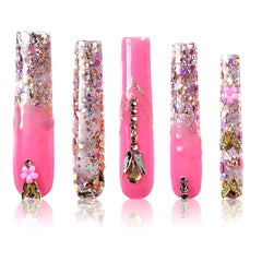 Tmani extra-long handmade press-on nails with dramatic salon-style look for a statement manicure.