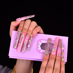 Tmani handmade PMMA nail tips offering durable, reusable glam.