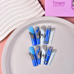 Tmani handmade square nails show salon-quality craftsmanship at home.