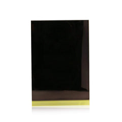 Tom Ford Eye Color Quad Suspicion close-up shows smooth texture for seamless blending.