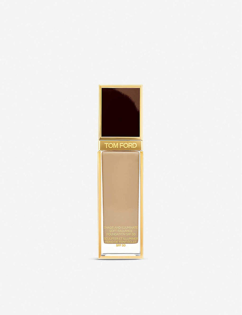 Tom Ford Shade and Illuminate Soft Radiance Foundation bottle pour highlights an even, luminous glow