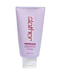 Topicals Slather exfoliating body serum bottle showcasing milky texture for smooth skin.