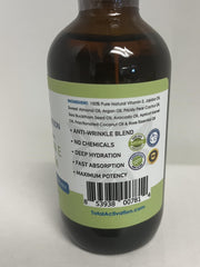 Total Activation Vitamin E Serum applied to the face for radiant skin