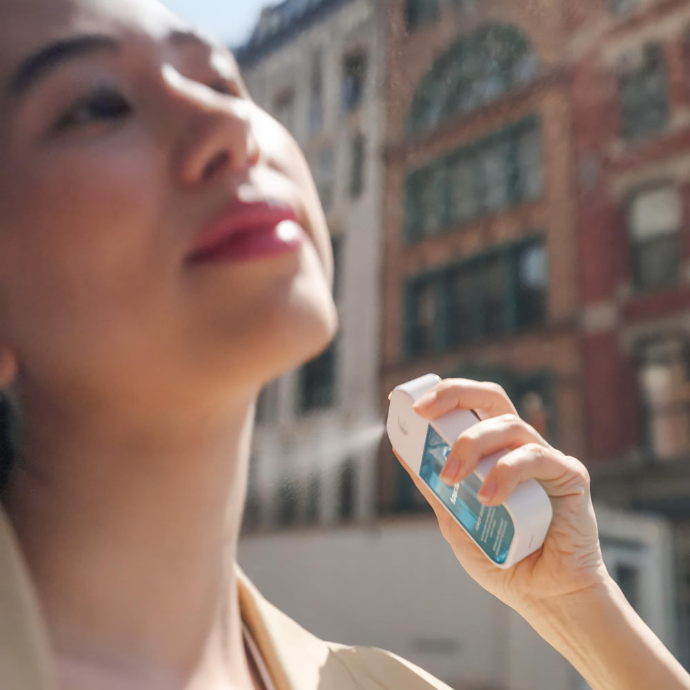 Touchland On-the-go essentials graphic, highlighting dermatologist-tested vegan formula.