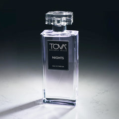 Tova Nights EDP bottle illuminated, evokes moonlit glamour for date nights.