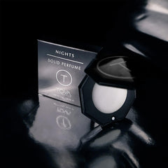 TOVA Nights solid perfume compact side profile showing sleek portability.