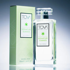 Tova Signature Summer 3.4 oz bottle on vanity highlighting bright citrus notes