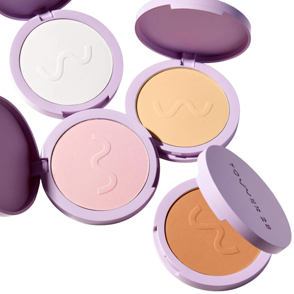 Tower28 GetSet pink setting powder packaging highlights talc-free formula for sensitive skin.