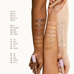 Tower 28 Swipe Serum Concealer texture glides on skin for seamless coverage.