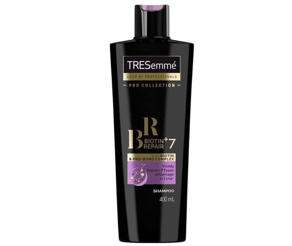 TRESemmé Biotin + Repair 7 shampoo bottle for nourishing damaged hair.