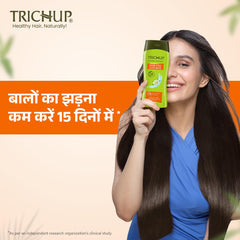 TRICHUP Hair Fall Control Herbal Shampoo closeup herbs showing tonic herbs in the formula.