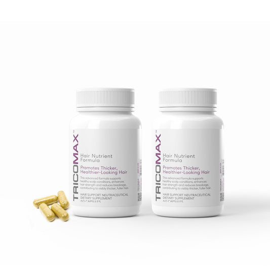 Tricomax hair growth bottle on a clean surface showing capsules for hair support.