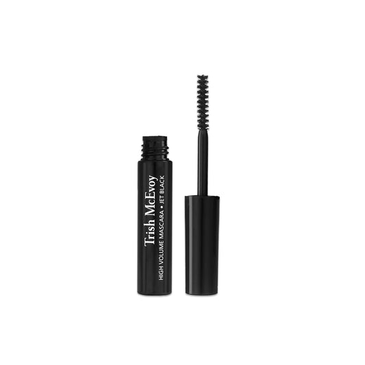 Trish McEvoy Travel Size Jet Black tubular mascara wand close-up showing volumizing coating