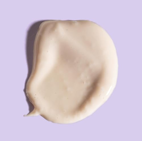 Tru Alchemy Eye Elixir eye-area application close-up during routine