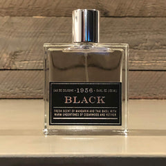 Tru Fragrance Beauty 1956 Black bottle side view highlights a refined, versatile presence.