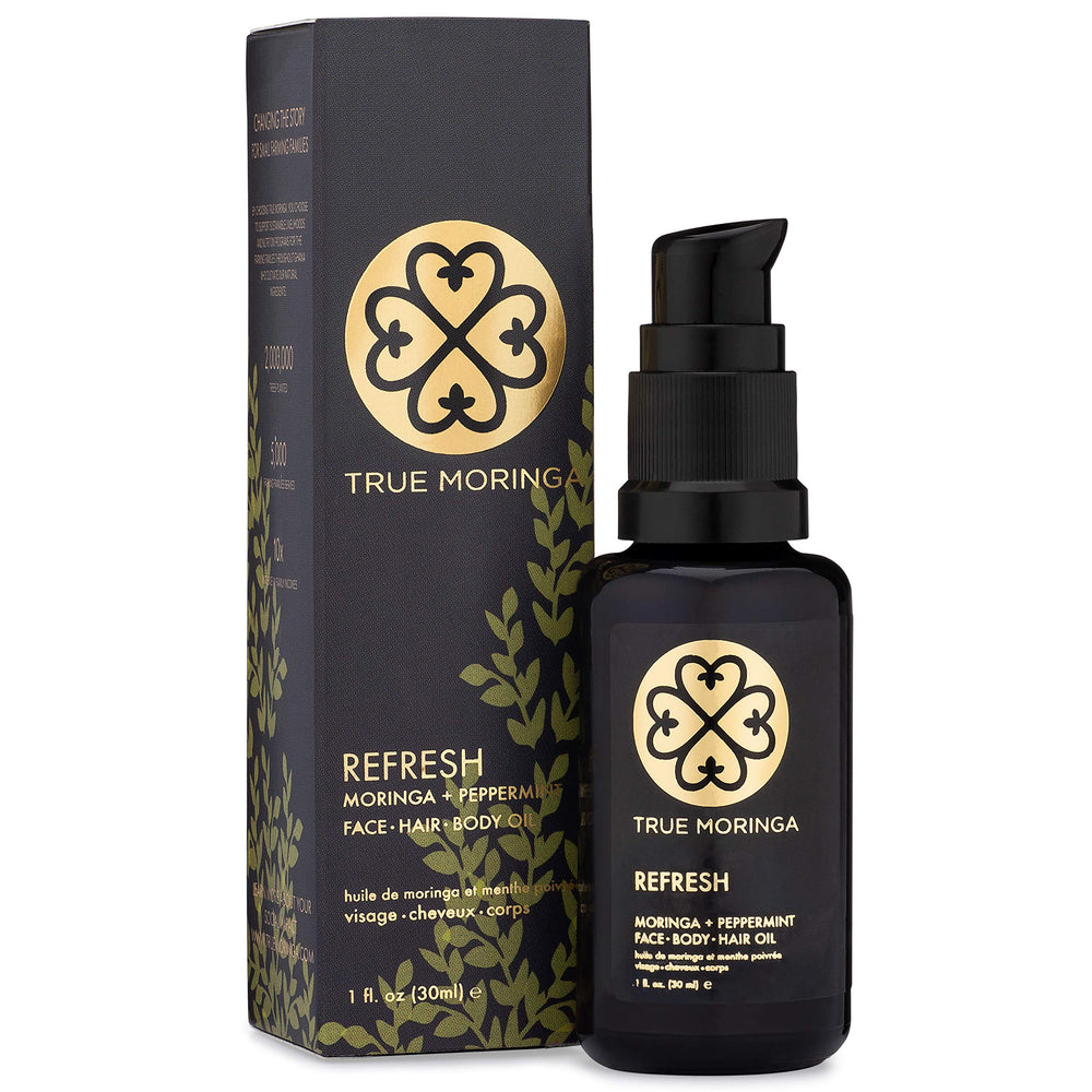 True Moringa Oil face bottle detail showcases purity and premium packaging.