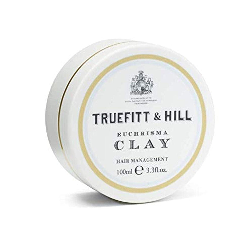 Truefitt & Hill Euchrisma Clay packaging on a vanity for premium grooming.