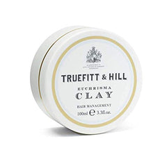 Truefitt & Hill Euchrisma Clay packaging on a vanity for premium grooming.