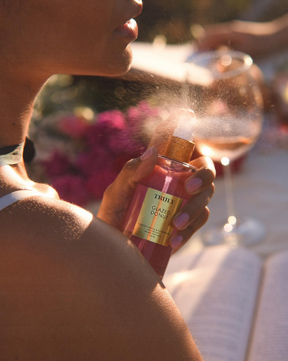 Truly Glazed Donut bottle display hints at premium gourmand experience.