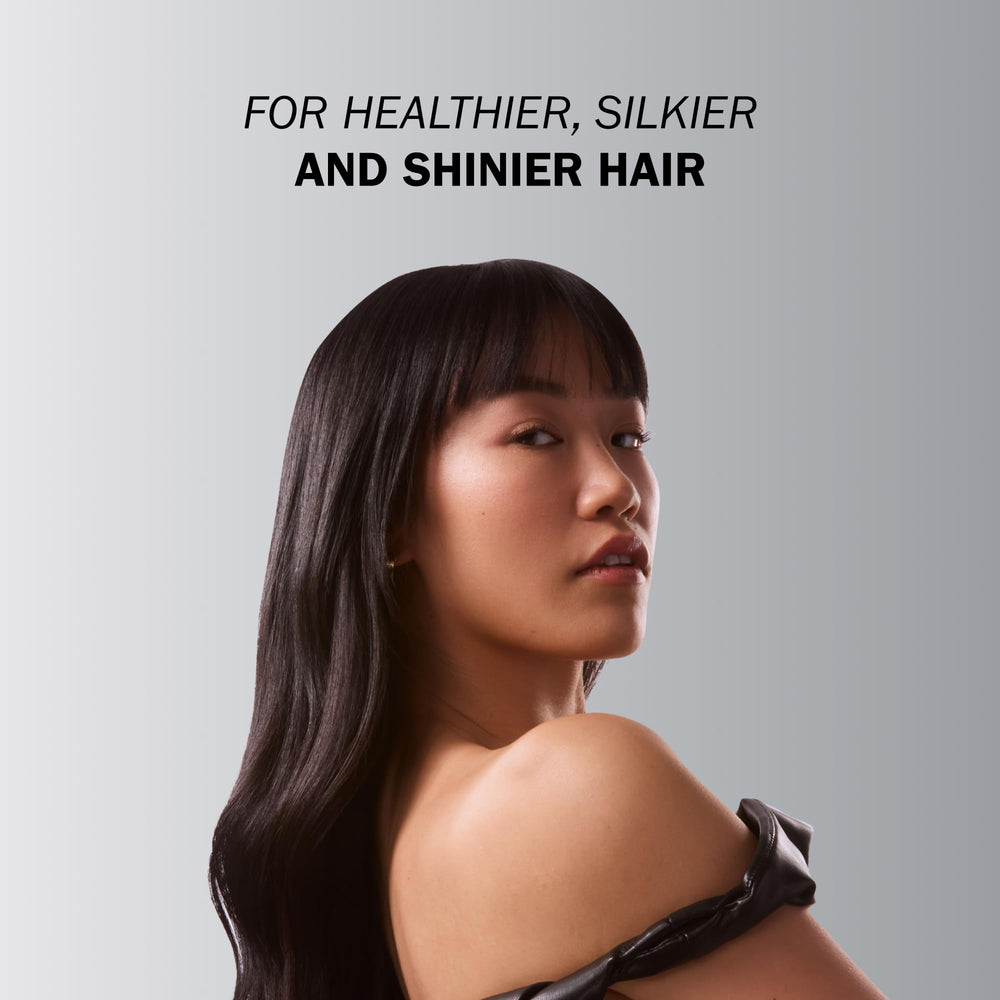 TRUSS Perfect Hair Conditioner label closeup emphasizes a clean, pH-balanced formula.