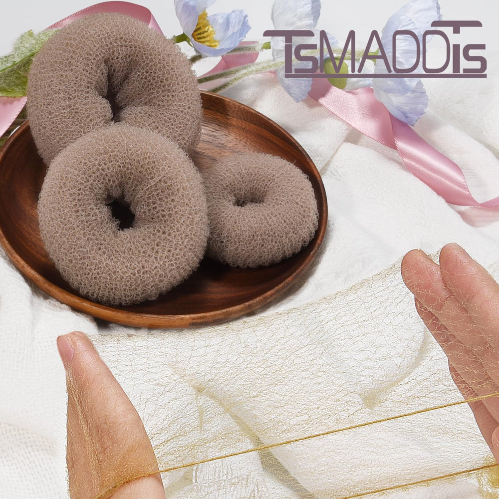 TsMADDTs elastic ties stabilize buns without pulling or damaging hair.