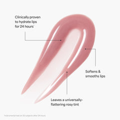 TULA Glaze Lip Treatment tube resting on a clean vanity.