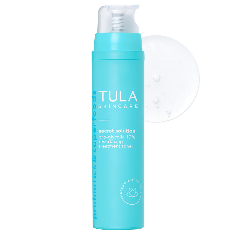 TULA Secret Solution Pro-Glycolic Toner bottle close-up for gentle exfoliation