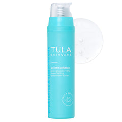 TULA Secret Solution Pro-Glycolic Toner bottle close-up for gentle exfoliation