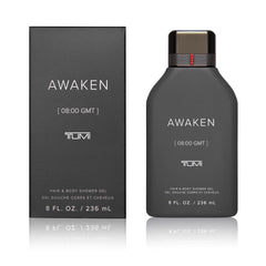 TUMI Awaken shower gel bottle with pour detail, energizing start to your day.