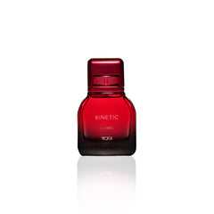 TUMI KINETIC amber-note close-up evokes warm, inviting first impression.
