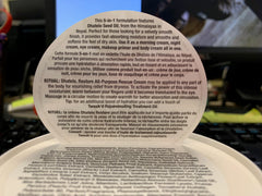 Tweak’d by Nature Restore packaging on a vanity desk, cruelty-free appeal.