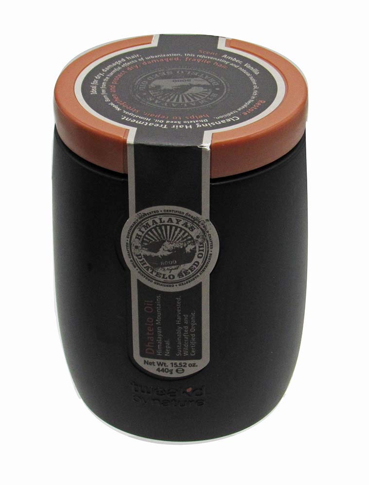 Tweak'd by Nature Restore Cleansing Hair Treatment bottle, supports repair and detangling.