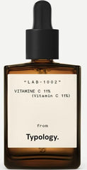 Typology Radiance Serum bottle with dropper for radiant, even complexion.
