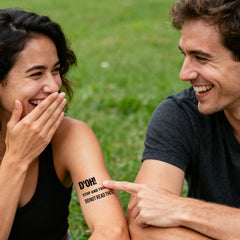 UBICA arm tattoo with funny text demonstrates party-ready styling.