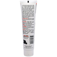 Udderly Smooth hand cream tube closeup showing label and texture benefits.
