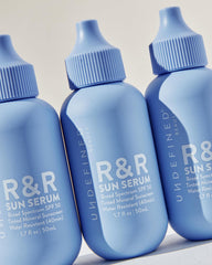 Undefined Beauty R&R Sun Serum application tip shows easy, streak-free use.