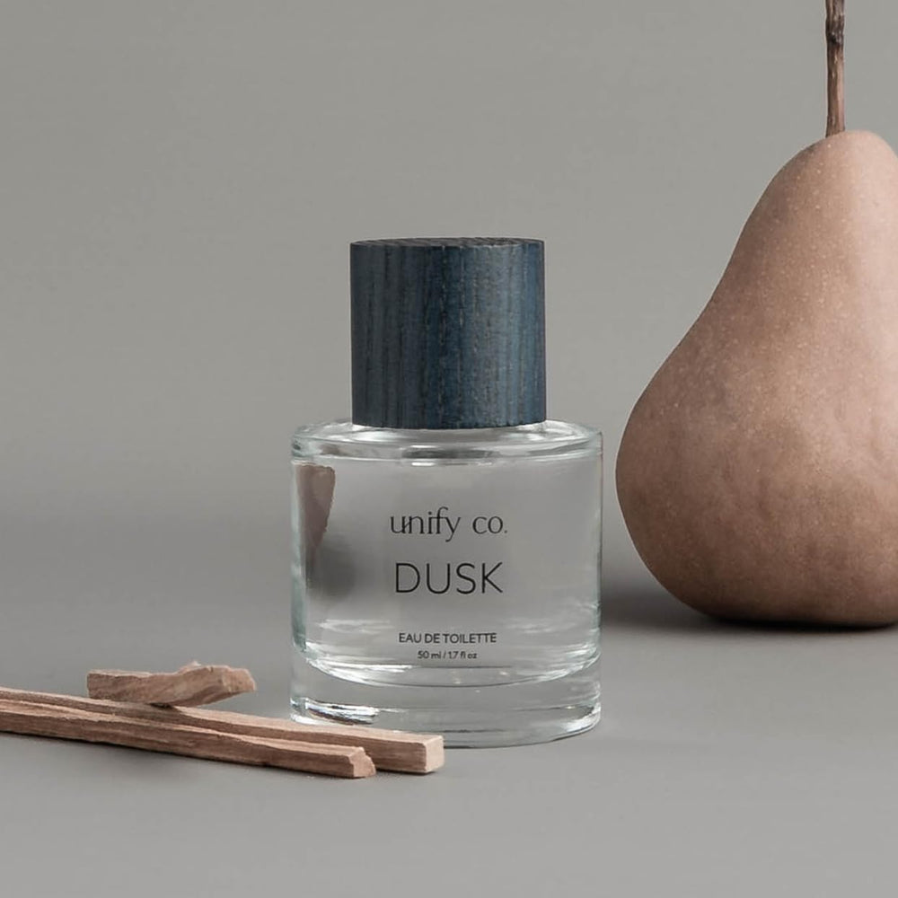 Unify Dusk pulse-points application illustrates versatile mood for daily wear.