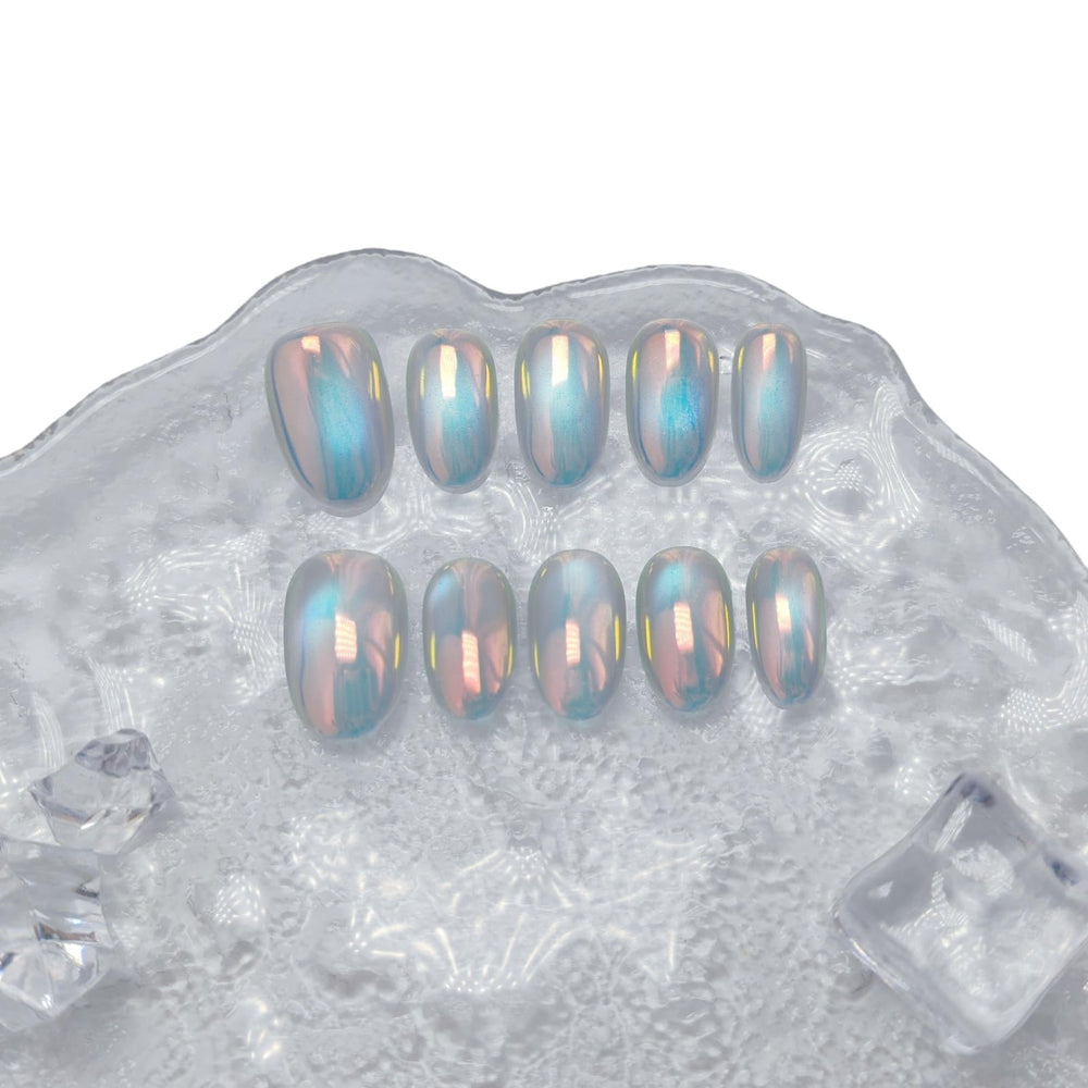 Uniyvoh cat eye nails with Aurora Bubbles design for radiant shimmer and depth