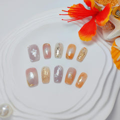 Uniyvoh hand-painted flower nails for delicate salon-like mani at home