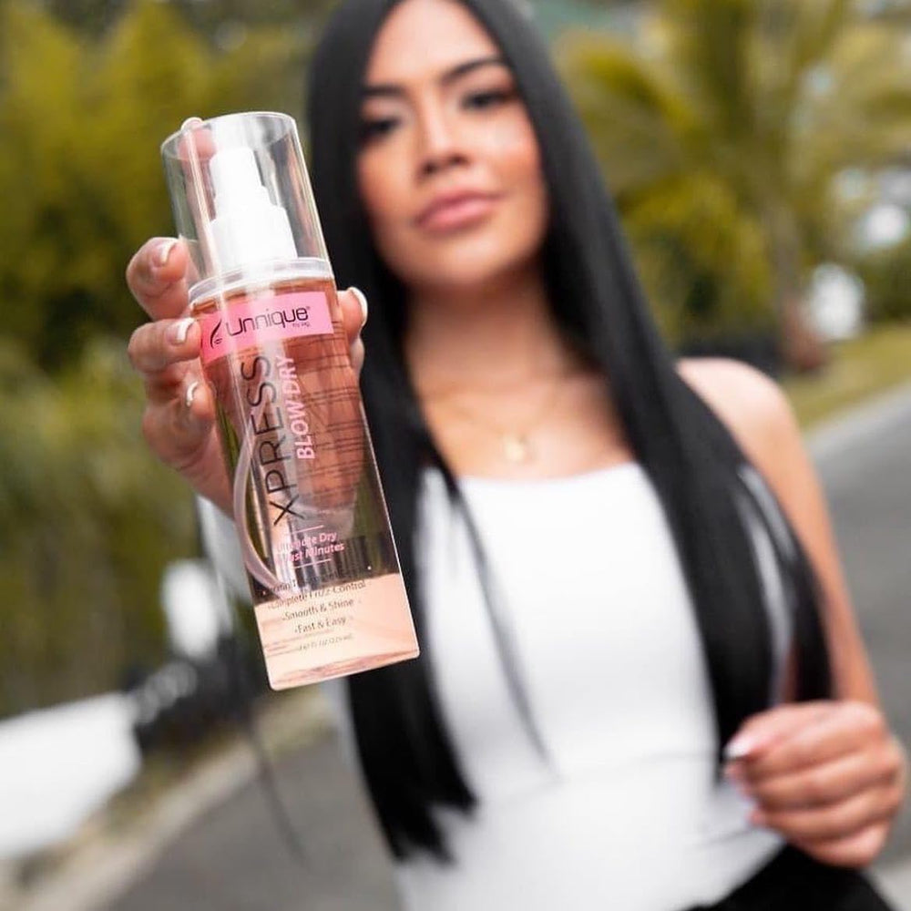 Unnique spray provides heat protection for styled hair against heat tools.
