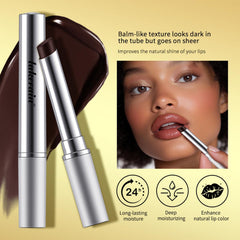 URQT honey balm tube close-up with glossy finish and pink-black design