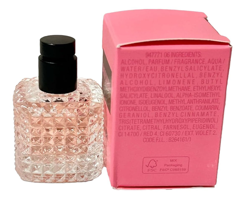 Valentino Born In Roma EDP dabber cap close-up highlighting compact format.