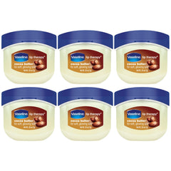Vaseline Lip Therapy Cocoa Butter mini jar close-up showing smooth lips.