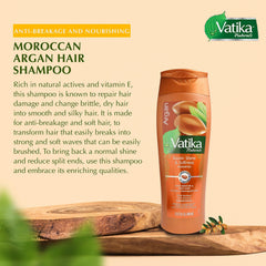 Vatika Naturals Argan Oil Shampoo close-up with argan oil droplets.
