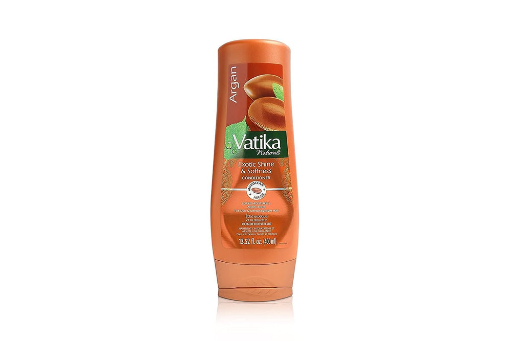 Vatika Naturals Moisturizing Conditioner bottle front shows hydrated, silky hair after use.