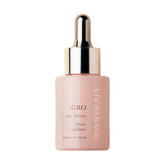 VEGAMOUR GRO Hair Serum bottle close-up with non-greasy daily-use formula.