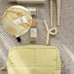 Veki Puffy yellow small close-up quilting highlights soft protection.
