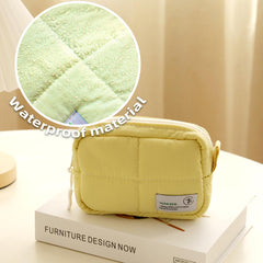 Veki Puffy in travel bag demonstrates convenient space-saving storage.