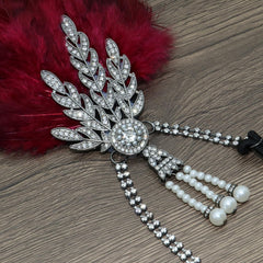 Venofen 1920s party headband adds vintage charm and sparkle.