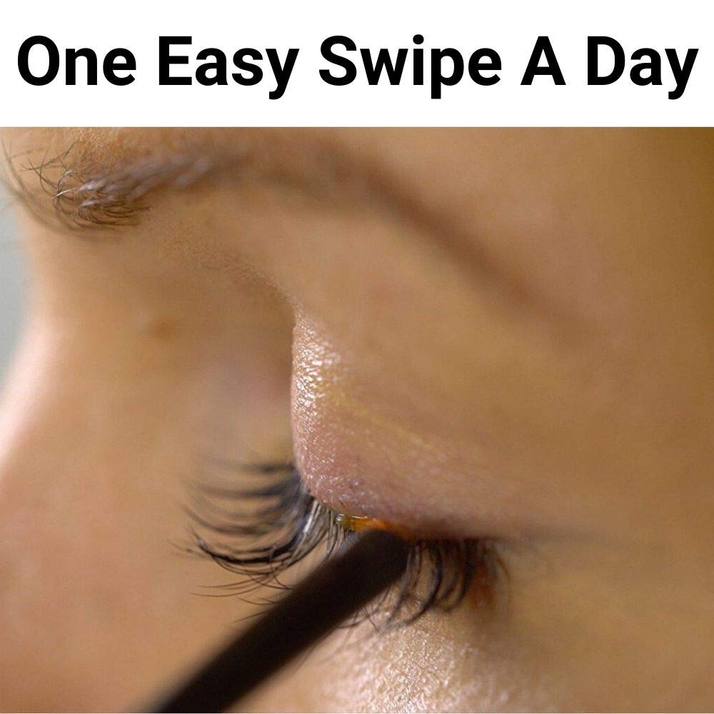 Vera Botanics Lash & Brow Booster Serum in use on the eyelid area.